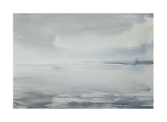 Image of sky and sea after a storm with light shining down on the water, in a palette of greys with a soft blue