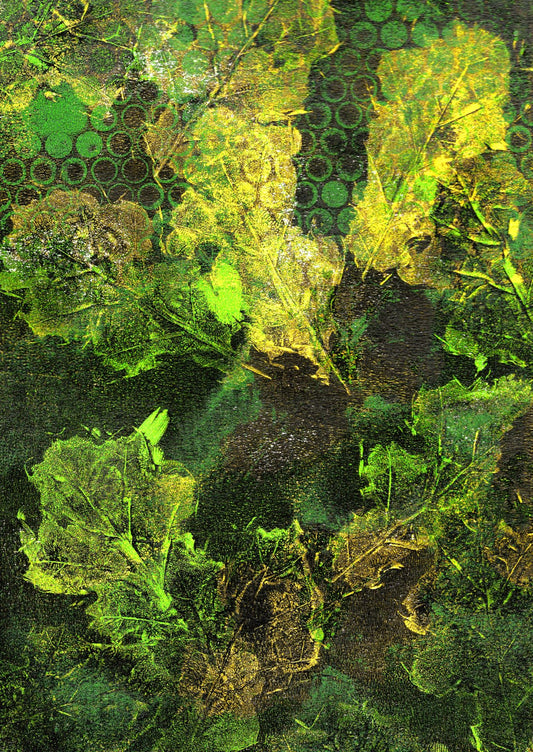 Abstract monotype print with leaves in golden green, yellow and brown hues